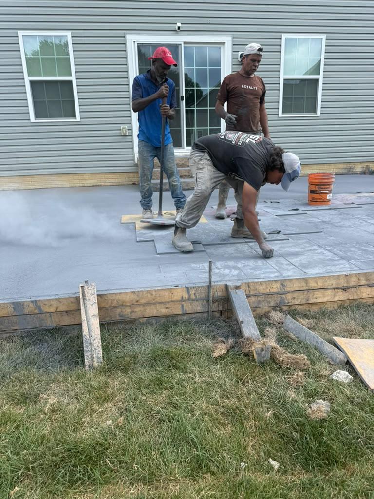 Multi-level residential stamped concrete patio and custom steps