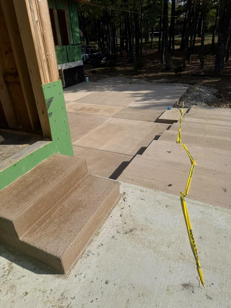 Poured concrete entry steps and foundation slab